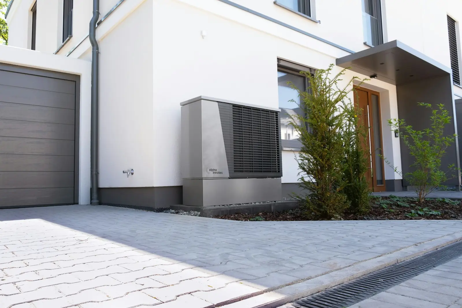 A modern house with a heat pump unit